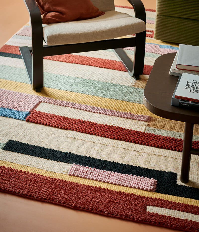IKEA-bronden cok renkli el dokumasi hali